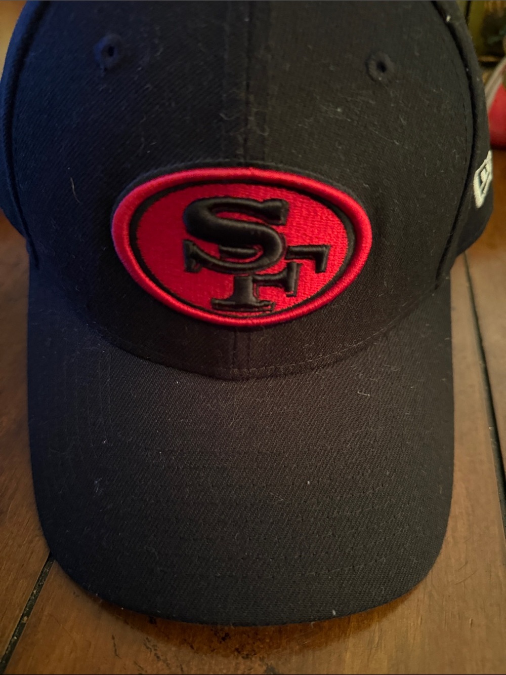 New Era Black Hat with Red SF Patch